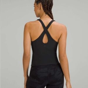 Lulu Key to Balance yoga top. Size 4. Perfect condition. Built in bra. Above hip